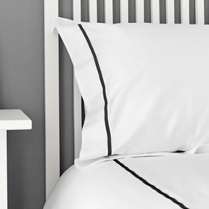 bed with Harmony Egyptian cotton flat sheet