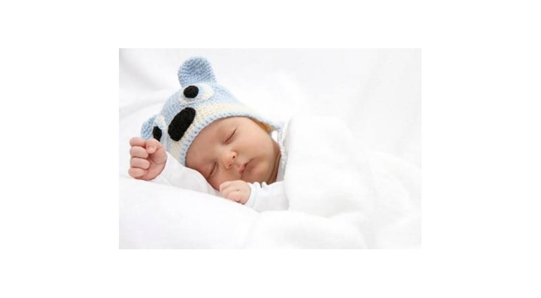 Baby sleeping soundly on the correct duvet cover Selecting the Right Duvet Cover